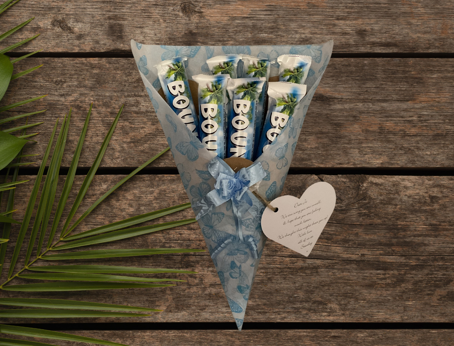 Bounty chocolate bouquet with a personalised gift tag and matching bow.