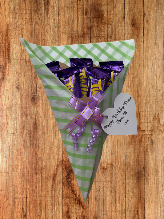 Cadbury twirl chocolate bouquet with a personalised tag and matching bow.