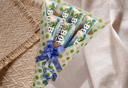 Bounty chocolate bouquet with a personalised gift tag and matching bow.